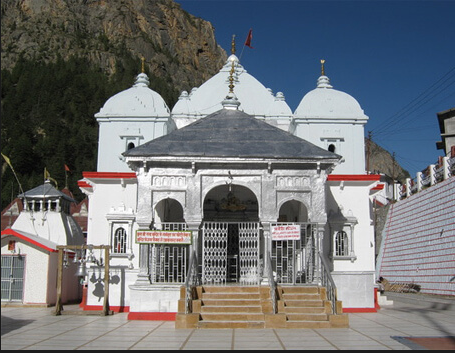 White structure of the Gangotri Temple situated in the Himalayas.
